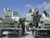 Ugandan Buffel wheeled armoured personnel carrier picture . Ugandan African Union soldiers keep guard on top of armoured personel carrier's, Wednesday, Oct. 24, 2007 as three Ugandan soldiers are flown to Nairobi, Kenya after they were injured in a mortar attack in the Somali capital, Mogadishu. Thousands of Somalis have died so far this year, many of them caught in the crossfire as Islamic insurgents battle government troops and their Ethiopian allies. An Islamic alliance gained control of Mogadishu and much of southern Somalia last year, until they were ousted by Ethiopian soldiers supporting the shaky U.N.-backed government.