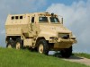 Etats Unis Caiman MRAP II véhicule blindé à roues photo . Avec le nouveau programme MRAP II,le gouvernement pourrait commandé la production de 20.500 véhicules MRAP II, les tets, les pièces détachées et le support logistique. L’une des compagnie choisie sur les deux sélectionnés, est la firme BAE Systems va produire le MRAP II basé sur la conception du véhicule 6x6 Caiman et du véhicule de la catégorie MRAP II, le véhicule 6x6 RG33. Six véhicules de la catégorie MRAP II avec une solution de blindage additionnel seront fournis au client en Mars 2008, pour la réalisation de tests sur base du contrat de livraison. Les véhicules blindés RG33 et Caiman ont la bonne moyenne au niveau de la capacité de chargement, de la protection balistique et ont prouvé leur extrême capacité a être manipulé dans les meilleurs conditions. Leurs conceptions offrent une avancé au niveau de la mobilité en augmentant les capacités de chargement, en permettant l’intégration de moyens de survie à travers le spectre de menace.