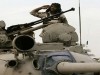 Iraqi Army T-55 main battle tank picture . Iraqi special forces and armourd vehicle parade outside Basra Palace after a security handover ceremony. Britain's decision to "flee" Iraq shows the insurgency is stronger than ever, Al-Qaeda's number two said Sunday, after British forces transferred security control in Basra province to the Iraqis.