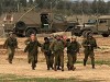 Israel army Israeli soldiers picture . Israeli soldiers evacuate a colleague, injured during an Israeli military operation near Bureij, in the southern Gaza Strip, near the border with Israel, Sunday, Jan. 6, 2008. Israel's military has stepped up its campaign against Gaza rocket and mortar squads after a Palestinian rocket struck deep inside Israel last week, Prime Minister Ehud Olmert disclosed on Sunday, days ahead of U.S. President George W. Bush's visit to the region on a peacemaking mission.